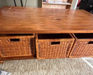 Coffee table with wicker storage baskets