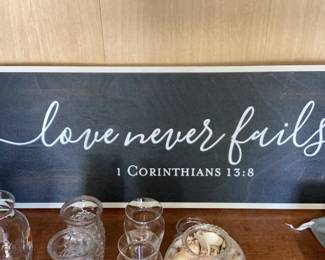 Love Never Fails Wall Sign