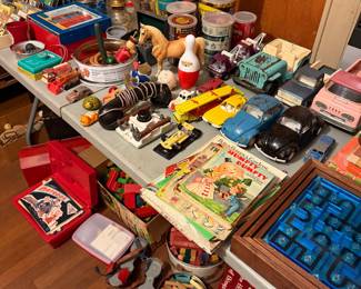 Vintage toys, cars trucks, director said games, books, red light, hot, wheels, etc. still unpacking crates