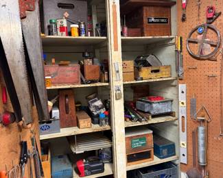 Just opened this cabinet. Lots of tools to sort