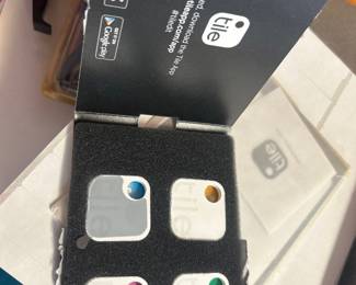 Tile-branded boxed item finder accessories.