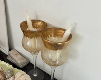 Gold-accented stemmed glasses displayed together.