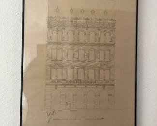 Framed architectural drawing showing a detailed building elevation.