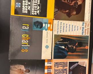 Jazz vinyl record collection with assorted album covers, including Charles Mingus.