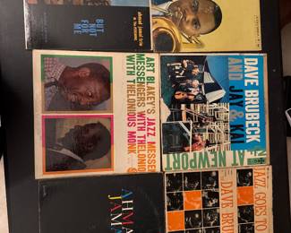 Jazz vinyl record selection including a Dave Brubeck album.