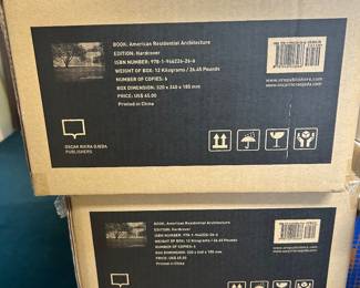 Stacked electronics packaging boxes; see individual items for contents.