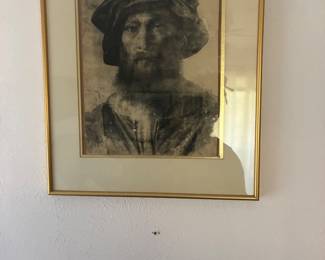 Framed portrait artwork in a gold-toned frame.
