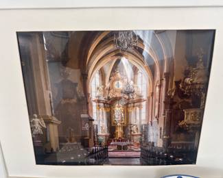 Framed architectural photograph featuring an ornate church interior and gilded altar.