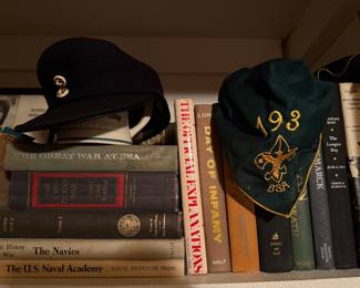 Authentic German soldier’s WWII hat, Boy Scouts scarf, vintage books
