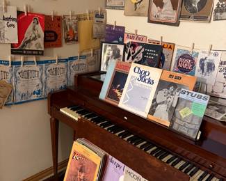 Playbills, autographed musical pieces, celebrity photos, letters from artists. 