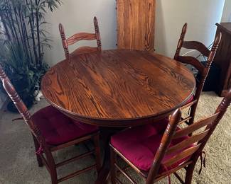 Oak Dining Table with 4 Cane Chairs. 