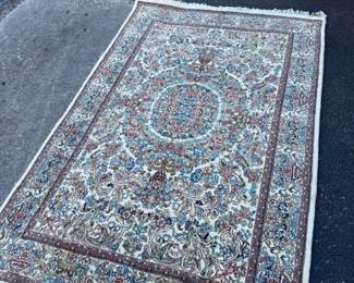 Beautiful wool rug, and knotted. Approximately 4' by 6'