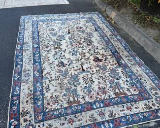 Another large rug, handmade. Great pattern, some wear. Unusual size, approximately 6' by 10'