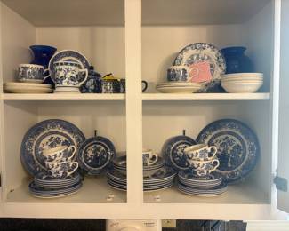 Beautiful collection of vintage blue-and-white china featuring classic Blue Willow patterns. Includes dinner plates, serving pieces, teacups, saucers, decorative dishes, and coordinating accessories. $125