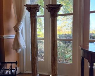Pair of Tall Neoclassical Fluted Architectural Columns with Ornate Corinthian Capitals — Impressive matching decorative columns featuring deeply fluted shafts, elaborate acanthus-leaf capitals, turned bases, and square plinths. Beautiful distressed antique-style finish with aged patina. Ideal for traditional interiors, architectural display, or use as decorative pedestals. Sold as a pair.