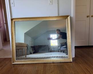 Large vintage rectangular giltwood wall mirror styled in a traditional Federal or Louis XVI Neoclassical aesthetic