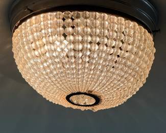 Flush-mount crystal-beaded basket chandelier, sometimes called a crystal dome ceiling light or Empire-style flush-mount chandelier
