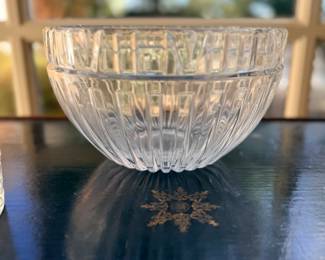 Pair of Clear Ribbed Pressed-Glass Serving Bowls — Two matching clear glass bowls featuring vertical fluted detailing, rounded sides, and thick rims. Classic versatile design suitable for serving or decorative display.