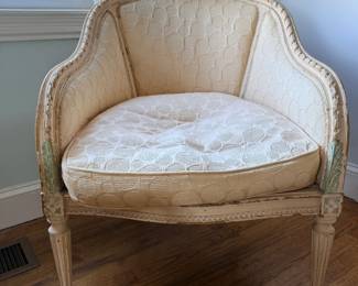 French Louis XVI–style upholstered bergère (enclosed armchair)