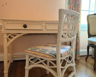 Vintage white-painted rattan or bamboo writing desk with a matching chair, in a coastal or Hollywood Regency-inspired style