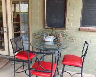 Outdoor Glass Table and Chairs with Some Decor