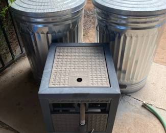 Two Heavy Duty Galvanized Trash Cans and a Hose Reel Container