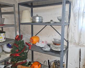 basement. items for sale and shelving for sale. Bring help to move.