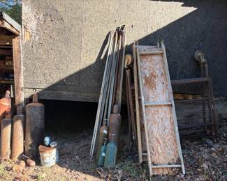 scaffolding- 3 bucs high with braces and walk boards & wheels- $300.00