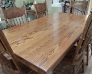 Dining table and 6 pressed back oak chairs!