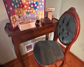 2 of these small desks with green chairs available 