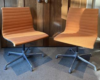 Pair of Vintage Herman Miller Eames-Style Aluminum Group Swivel Chairs - Orange Upholstery