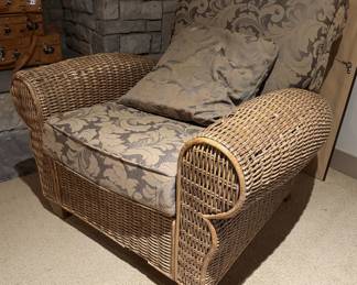 Elegant Woven Wicker Armchair with Ornate Floral Damask Upholstery & Accent Pillow