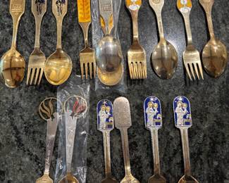 Anton Michelson Gilded Sterling Silver and enameled Danish Christmas forks and spoons Dating from 1910 to 1987 total of 90 pieces.
