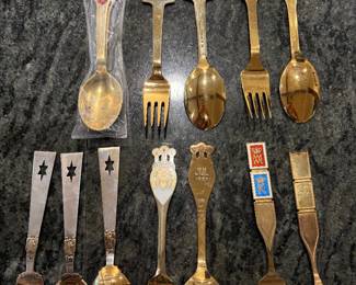 Anton Michelson Gilded Sterling Silver and enameled Danish Christmas forks and spoons Dating from 1910 to 1987 total of 90 pieces.