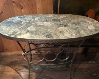 Stone and iron wine table