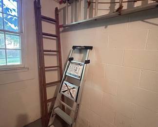 Assorted ladders and tools