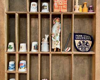 TRINKETS AND THIMBLES