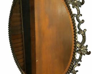 Ornate gold oval wall mirror – gold-tone metal scroll frame | Lot 1122, bids start at $20