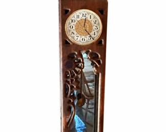 Wall clock – tall dark pierced wood scrollwork wall clock | Lot 1017, bids start at $20