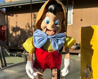 Telco Disney Pinocchio animated singing figure with stand & box – Disney Classics | Lot 1247, bids start at $10