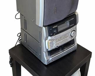 Electronics lot – Aiwa CA-DW635 stereo, Jensen clock radio, cordless phones, fan | Lot 1082, bids start at $10