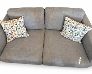 Gray loveseat – 2-seat sofa with pillows | Lot 1144, bids start at $25