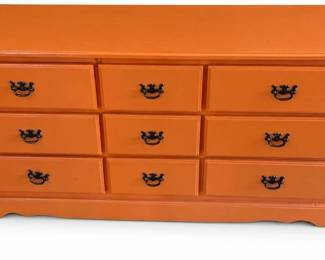 Nine-drawer dresser – long orange painted chest of drawers with bail pulls | Lot 1015, bids start at $40
