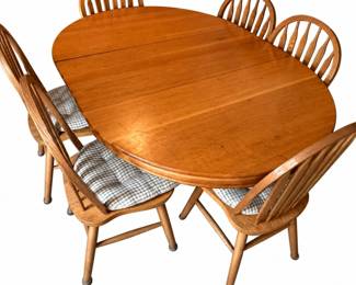 Dining room set – oval extension dining table, 4 leaves & 6 spindle-back chairs with cushions | Lot 1016, bids start at $175