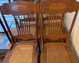 eight press-back chairs, good cane seats