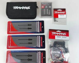 Lot 049  Traxxas RC Parts  Accessories Lot  HighTorque 600 Servo, BEC Kit, Drive Shafts  Case