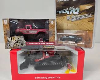 Lot 047  Lot of 3 Boxed Diecast Models  King Kong Ford F250, Mad Max Falcon XB  PistenBully Snowcat