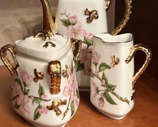 Vintage Austrian 3-piece gilt-decorated porcelain coffee set.
