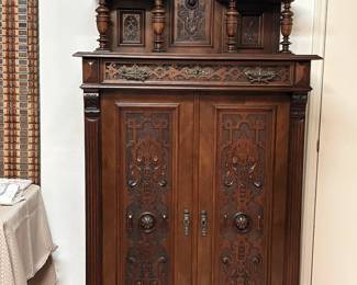 Late 19th century English Renaissance Revival mahogany cabinet with blind fretwork. Was $1,800…now $800