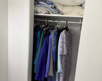 Women’s clothing and pillows and blankets
